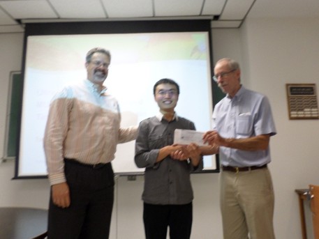 Scholarship presentation to Kun Guo by Stephen Reford and Jerry Roth. 