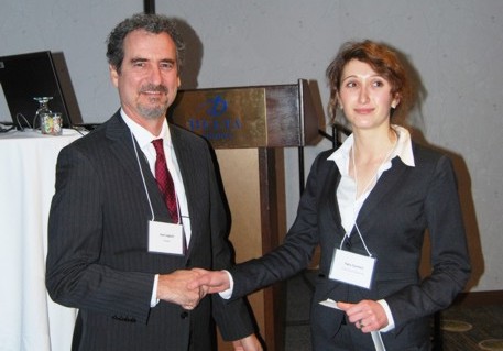 Scholarship presentation to Yana Tyomkin, University of Manitoba, by Jean Legault, KF Director.